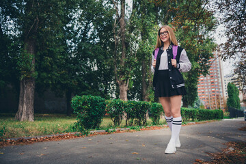 Wall Mural - Full length photo of lovely teen lady autumn school shopping sales dressed stylish uniform garment autumn park sunny day background