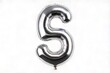 © Marco Mamdouh - Silver balloon shape for number 5 on white background, number five in silver balloon shape