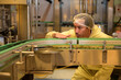 Professional winemaker controlling wine making process and quality at winery factory