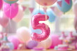 Bright pink helium balloon in shape of number five. Child girl birthday party for 5 years celebration, copy space