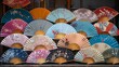 Oriental paper fans collection background. Japanese store display