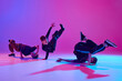 © Lustre Art Group  - Energetic photo of talented boys, in black attire dancing hip-hop in motion in mixed neo n light against vibrant gradient background. Concept of sport and hobby, music, fashion and art, movement. Ad