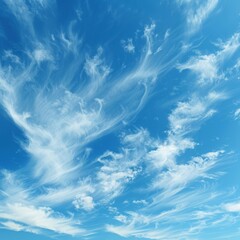 Wall Mural - scenic view of a clear blue sky with fluffy white clouds in the background landscape.