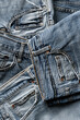 Group of aged blue denim jeans