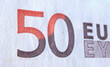 Close up fragment of 50 Euro description on banknote