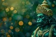 green colored Hanuman statue with bokeh background