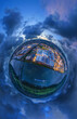 Industrial area, of Worms at Rhine river, evening aerial little planet
