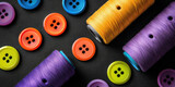 Fototapeta  - Colorful buttons and spools of thread assorted, variety of sewing accessories. Closeup background.