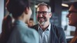 © yj - a happy group of business people having a conversation in an office, a businessman wearing glasses and a woman talking to each other. generative AI