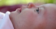 © Marco - Beautiful baby newborn infant closeup face outside