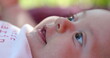 © Marco - Beautiful baby newborn infant closeup face outside