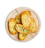 Fototapeta Lawenda - Garlic crisp bread Slices Topped With Herbs on cutting board isolated on white background.