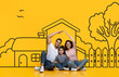 © Prostock-studio - Middle eastern family consisting of parents and daughter sit on the floor. In front of them is a large drawing of a house, possibly a dream home. They appear to be discussing or admiring the artwork.