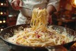© Luna_Scarlet - Chef serving spaghetti carbonara with parmesan in a rustic kitchen setting. Close-up action shot with dynamic lighting. Italian cuisine and cooking experience concept. Design for menu and culinary