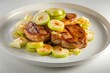 Allspice Pork Chops with Caramelized Leeks, Burst of Flavor Apples, and Aromatic Butter