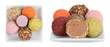 A variety of different truffles in a ceramic bowl Isolated on a white background. Top view. Flat lay