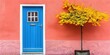 yellow tree in front of pink house with blue door