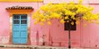 yellow tree in front of pink house with blue doo