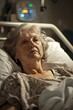 © Jorge Ferreiro - Elderly Woman Laying in Hospital Bed