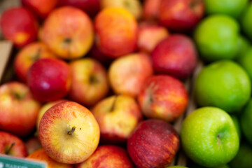 Wall Mural - Many of fresh ripe apples on the market, puts out for sale. Close-up image