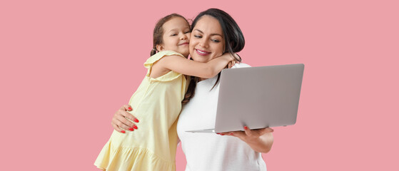 Canvas Print - Working mother with her little daughter on pink background