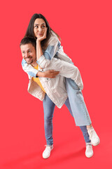 Sticker - Happy young couple on red background