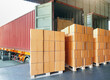 Package Boxes Stack on Pallets Loading into Container Truck. Distribution Warehouse. Container Shipping, Supply Chain. Supplies Shipment. Freight Truck Logistics Transport.