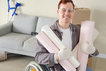 Poster - Young man in wheelchair with wallpapers during repair at home