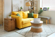 © Pixel-Shot - Interior of stylish living room with yellow sofa, coffee table and laptop
