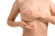 © Pixel-Shot - Naked young woman with marks on her breast against white background, closeup. Plastic surgery concept
