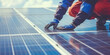 © MiniRiz - assembly of a photovoltaic system. Professional technician engineer mounting installing, fix and maintenance solar panel system on rooftop