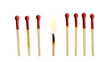 © mizan - Lit match next to a row of unlit matches isolated on a transparent background