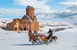 Horses pulling sleigh in winter - Ani Ruins, Ani is a ruined and  medieval Armenian city - Kars, Turkey