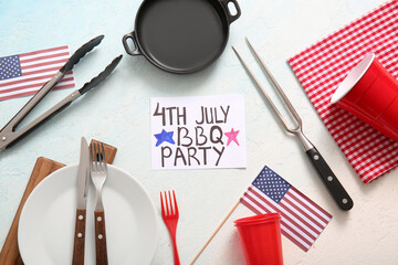 Wall Mural - Card with text 4th JULY BBQ PARTY, barbecue utensils and dinnerware on light background. Independence Day celebration