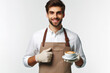 friendly barista with a cup of coffee on a white background