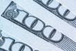 Macro image of  one hundred US Dollar bill. Close up. Selective focus. Horizontal image.