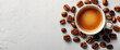 Hot coffee espresso and coffee bean on light background. Copy space. Top view