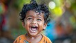 © pornchan - Indian toddler captured showing curiosity, laughing, crying, and a smile
