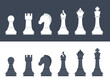 Vector illustration showcases a collection of chess pieces in classic black and white colors