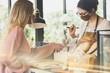 © Rawpixel.com - Woman wearing mask ordering food in a cafe restaurant covid 19