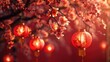 Numerous red lanterns hang from a tree, creating a vibrant and festive scene.