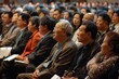 © viktorbond - large asian audience at a meeting listens to a speaker