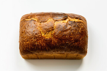 a loaf of bread sitting on top of a white surface