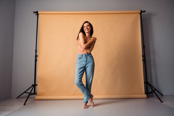 Sticker - Unretouched photo of body positive girl touch breast esteem imperfection photographing isolated studio background