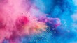 © Yusif - A burst of vibrant blue, pink, and yellow dust during Holi festival