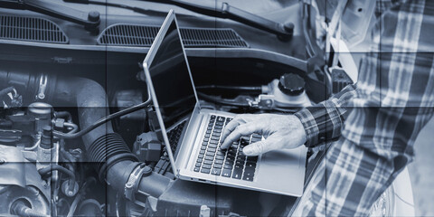 Wall Mural - Mechanic using laptop for checking car engine, geometric pattern