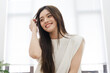 © Q88 - Portrait of beautiful young Asian girl at home