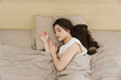 © Q88 - Portrait of beautiful young Asian girl at home