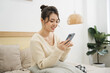 © Q88 - Portrait of beautiful young Asian girl at home