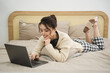 © Q88 - Portrait of beautiful young Asian girl at home